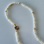 Elegant Pearl Necklace with Gold Accents