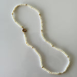 Elegant Pearl Necklace with Gold Accents