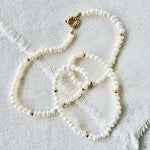 Elegant Pearl Necklace with 14Kt Gold Accents