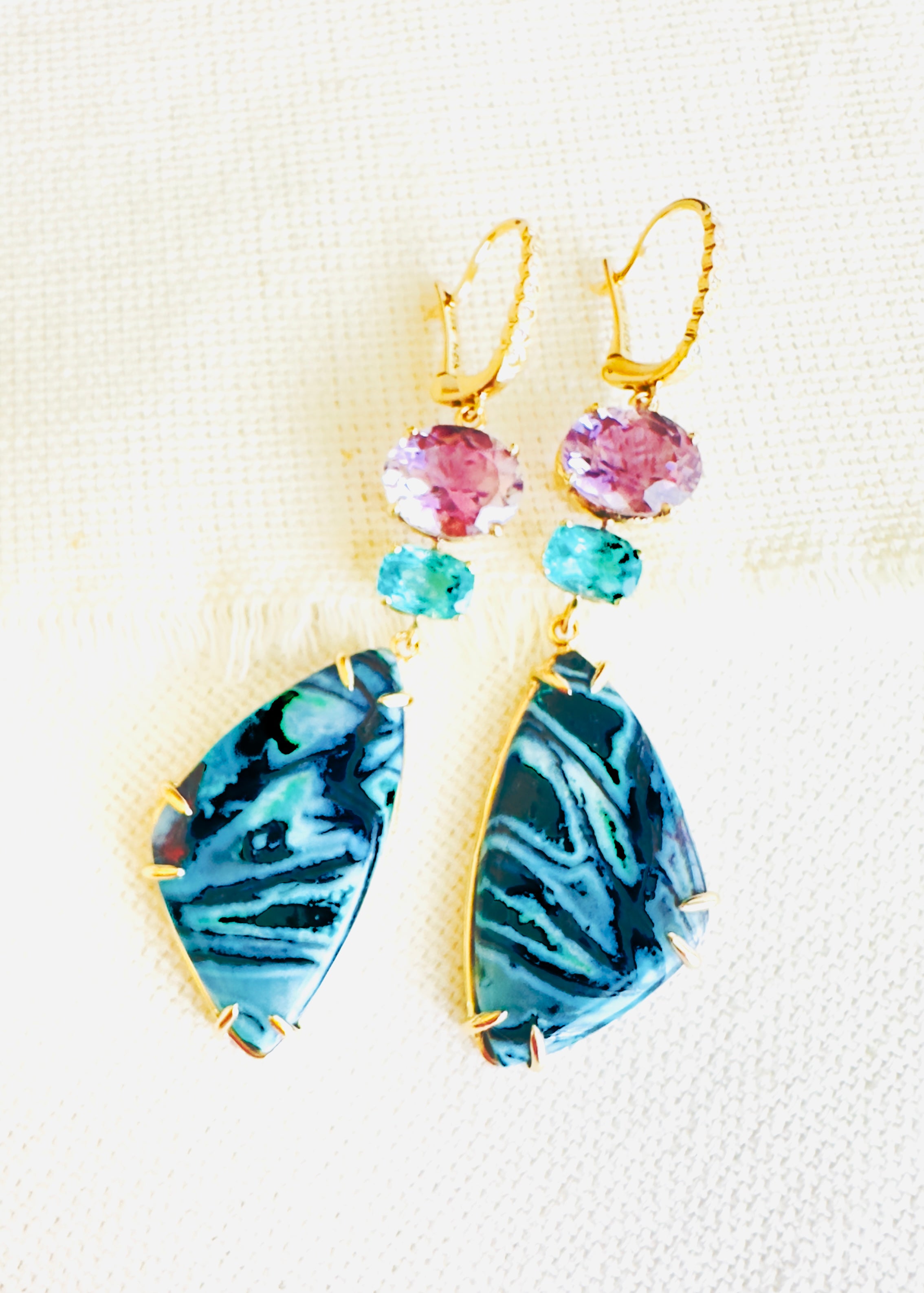 Luxury Indonesian fossilized opalized wood earrings set in gold with diamonds for the chic woman who is looking for a unique resort style