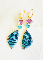 Luxury Indonesian fossilized opalized wood earrings set in gold with diamonds for the chic woman who is looking for a unique resort style
