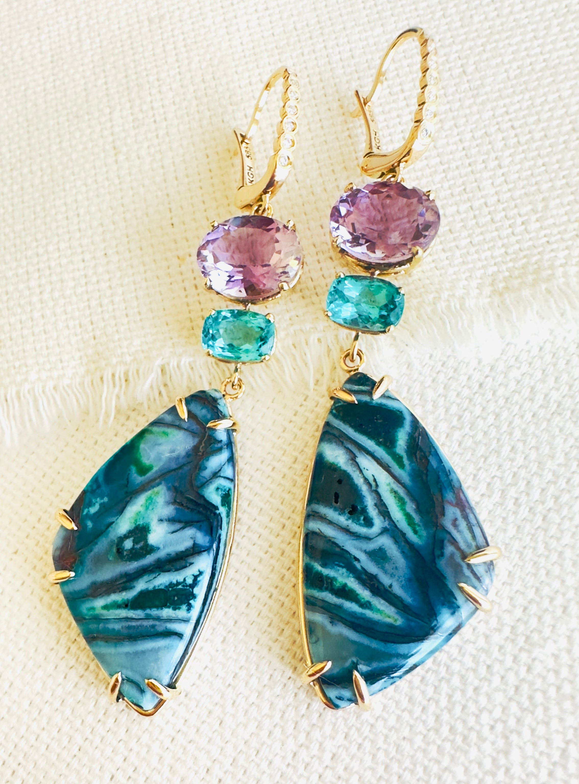 Luxury Indonesian fossilized opalized wood earrings set in gold with diamonds for the chic woman who is looking for a unique resort style