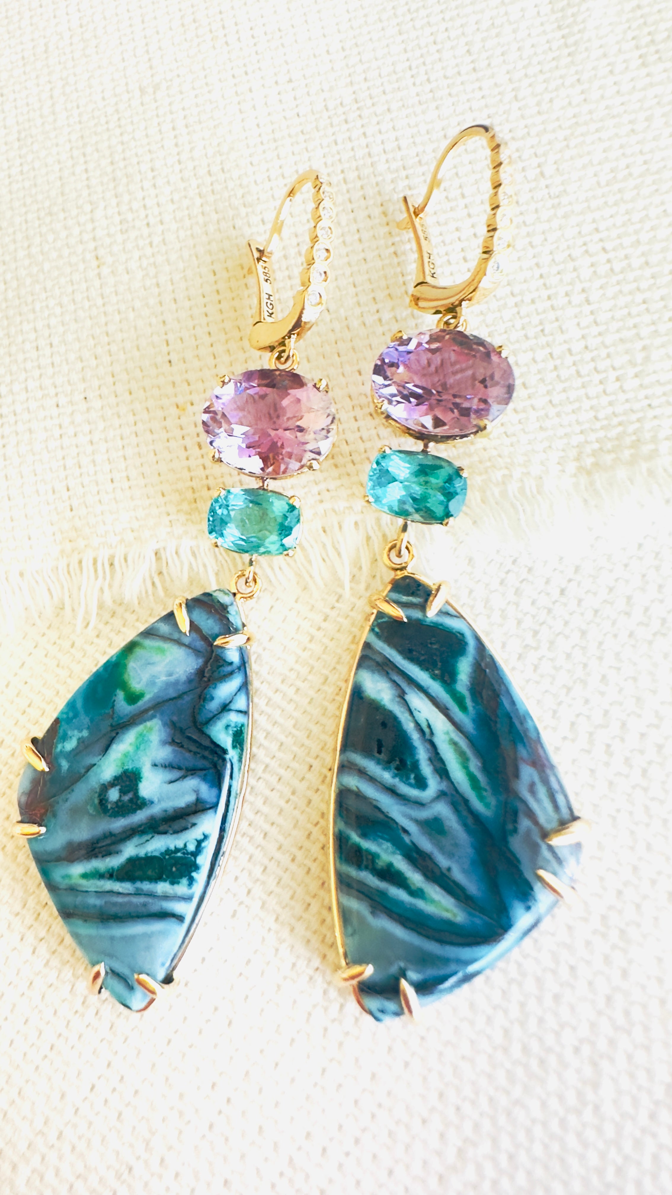 Luxury Indonesian fossilized opalized wood earrings set in gold with diamonds for the chic woman who is looking for a unique resort style