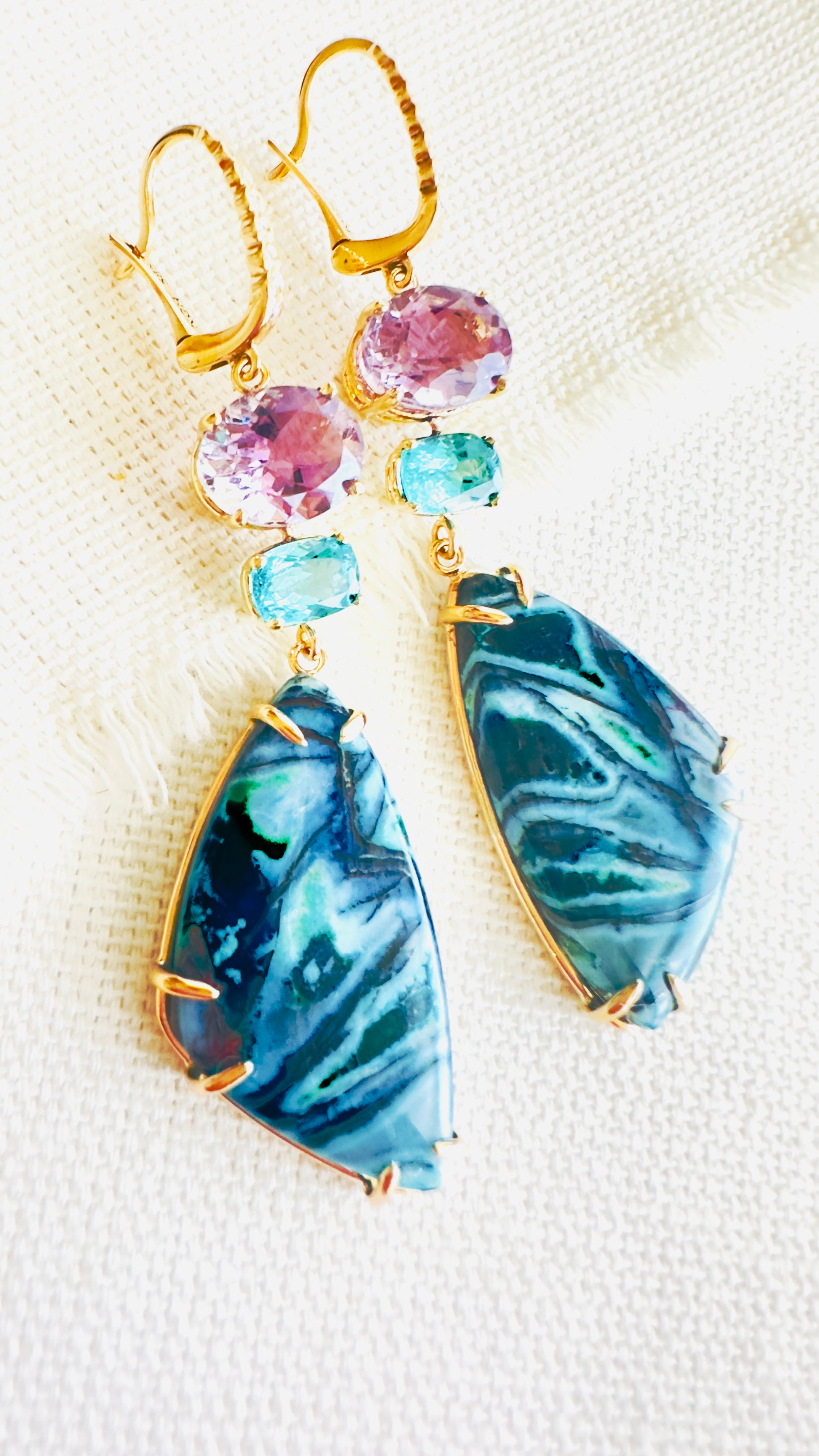 Luxury Indonesian fossilized opalized wood earrings set in gold with diamonds for the chic woman who is looking for a unique resort style.