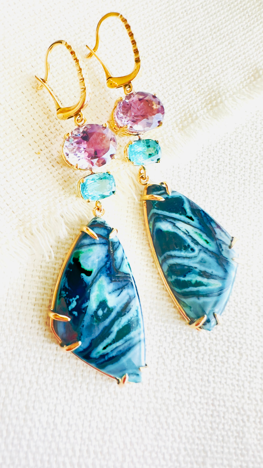 Luxury Indonesian fossilized opalized wood earrings set in gold with diamonds for the chic woman who is looking for a unique resort style.
