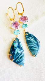 Luxury Indonesian fossilized opalized wood earrings set in gold with diamonds for the chic woman who is looking for a unique resort style.