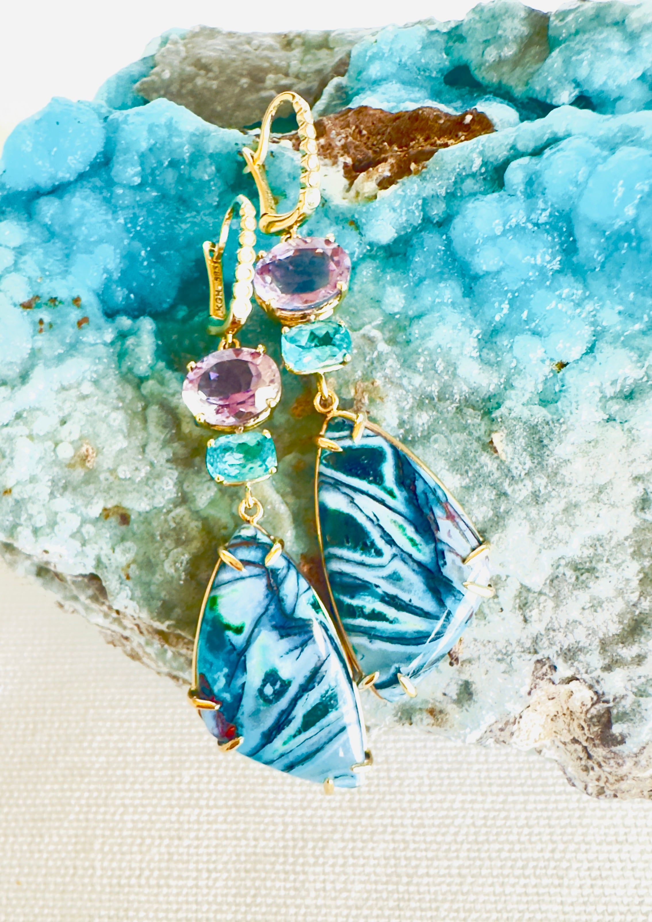 Luxury Indonesian fossilized opalized wood earrings set in gold with diamonds for the chic woman who is looking for a unique resort style