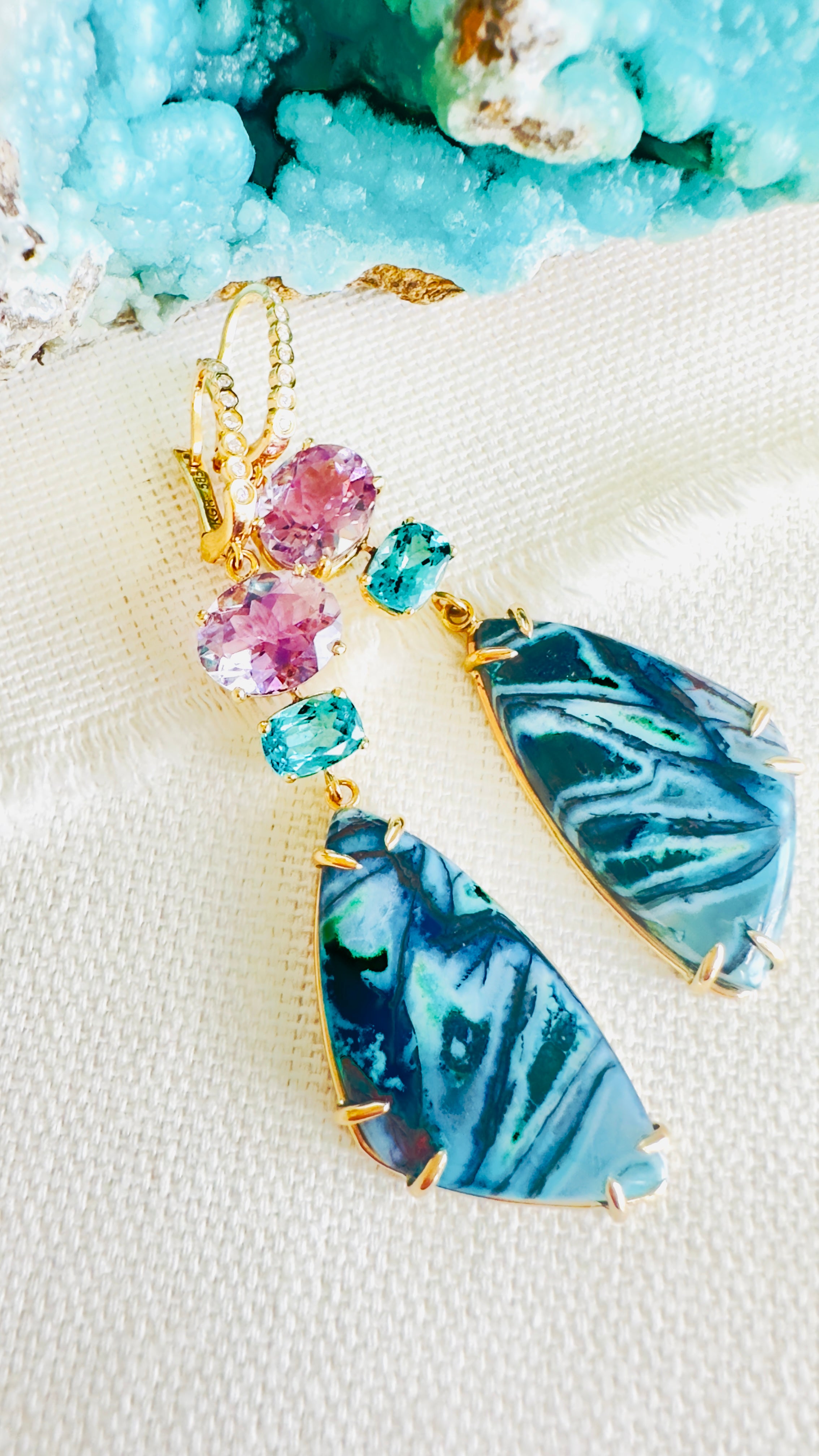 Luxury Indonesian fossilized opalized wood dangle earrings set in 14kt gold with diamonds for the chic woman who is looking for a unique resort style