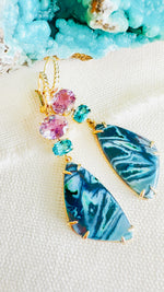 Luxury Indonesian fossilized opalized wood dangle earrings set in 14kt gold with diamonds for the chic woman who is looking for a unique resort style