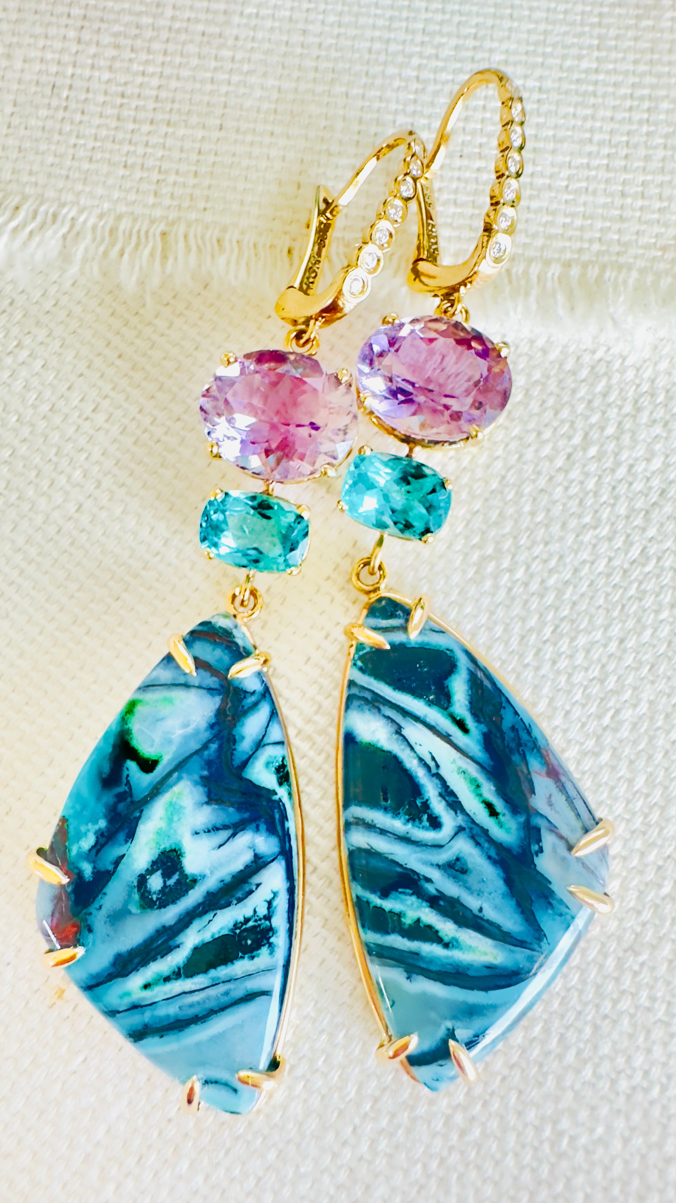 Luxury Indonesian fossilized opalized wood earrings set in gold with diamonds for the chic woman who is looking for a unique resort style