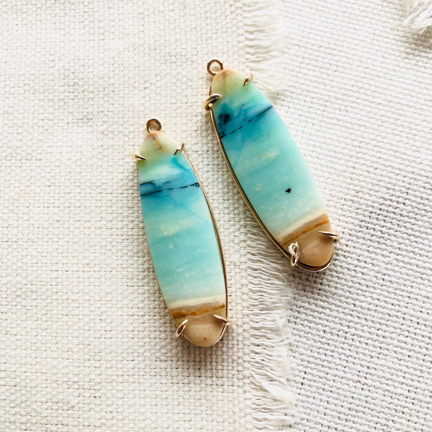 These blue opalized fossilized Indonesian wood earrings remind me so much of the beaches in Hawaii.  Blue opal jewelry is rare and hard to find.
