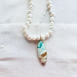 This stunning blue opalized fossilized Indonesian wood necklace reminds me of the ocean and beaches of Hawaii.  Blue opalized wood has recently been discovered and makes for gorgeous one of a kind resort jewelry.