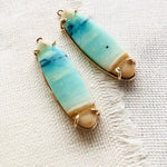 These blue opalized fossilized Indonesian wood earrings remind me so much of the beaches in Hawaii. Blue opal jewelry is rare and hard to find.