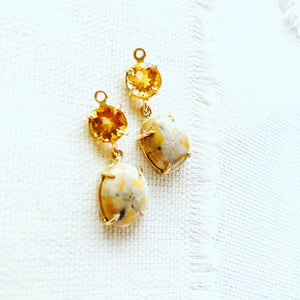 Sea urchin earrings paired with citrine and set in 14kt gold.  These fossilized sea urchin earrings make a beautiful long lasting souvenir from Hawaii.