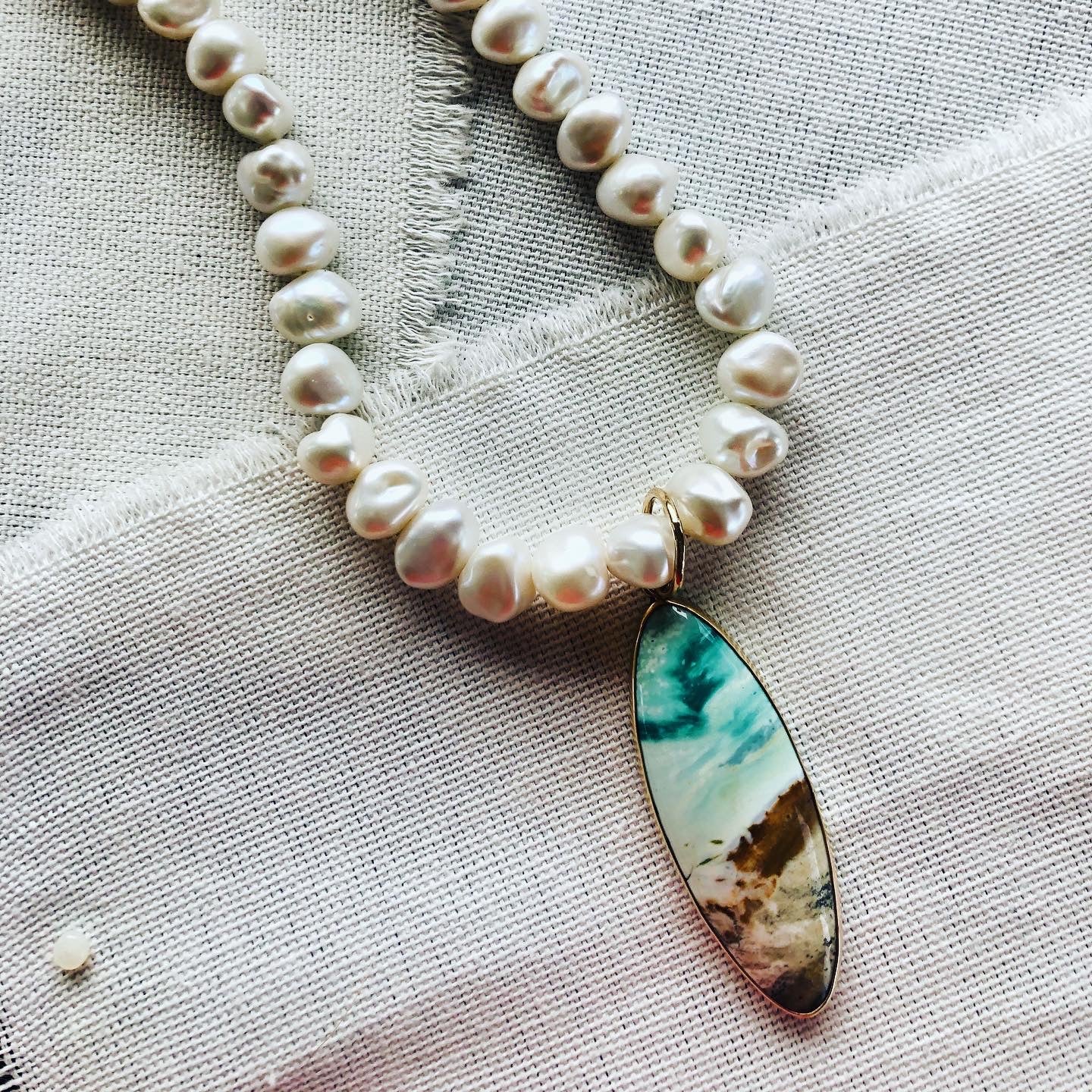 This stunning blue opalized fossilized Indonesian wood necklace reminds me of the ocean and beaches of Hawaii.  Blue opalized wood has recently been discovered and makes for gorgeous one of a kind resort jewelry.