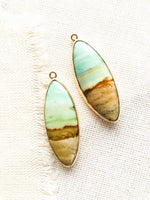 A little bit of ocean and beach?  These blue opalized fossilized Indonesian wood earrings remind me so much of the beaches in Maui.
