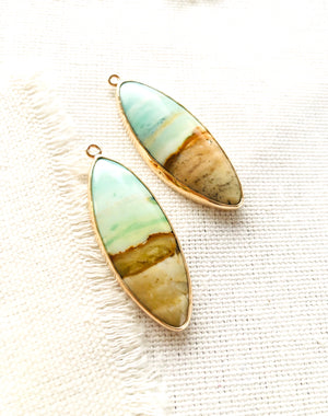 A little bit of ocean and beach? These blue opalized fossilized Indonesian wood earrings remind me so much of the beaches in Maui.