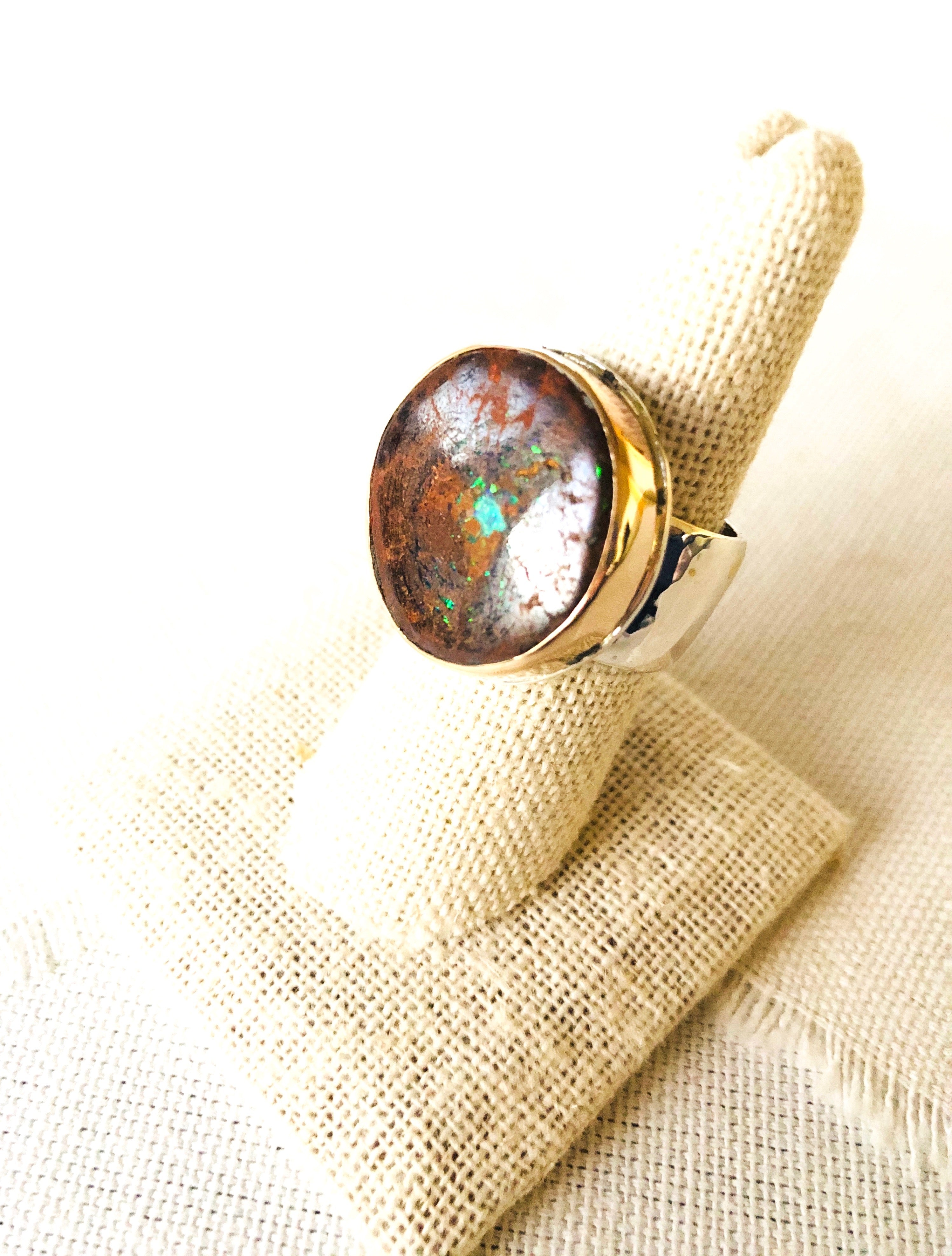 The contrasting colors of this Australian Yowah Nut Opal ring is so striking.  This one of a kind Australian Opal is known as Yowah Nut Opal is set in 14kt gold and sterling silver.