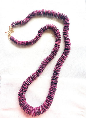 This one of a kind purple spiny oyster shell beaded necklace is, hand knotted between each bead, and finished with my signature 14kt gold clasp. This purple shell necklace is truly a favorite of mine.