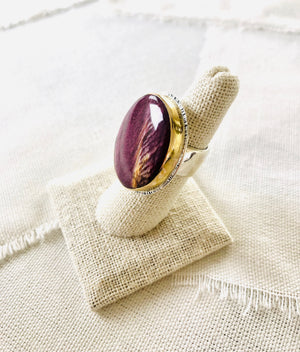 This is a beautiful elegant resort style spiny oyster shell statement ring set with a 14kt gold bezel and sterling silver  Edit alt text