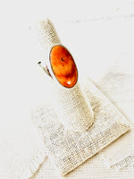 This simplicity of this beautiful orange spiny oyster shell ring makes a statement for itself.