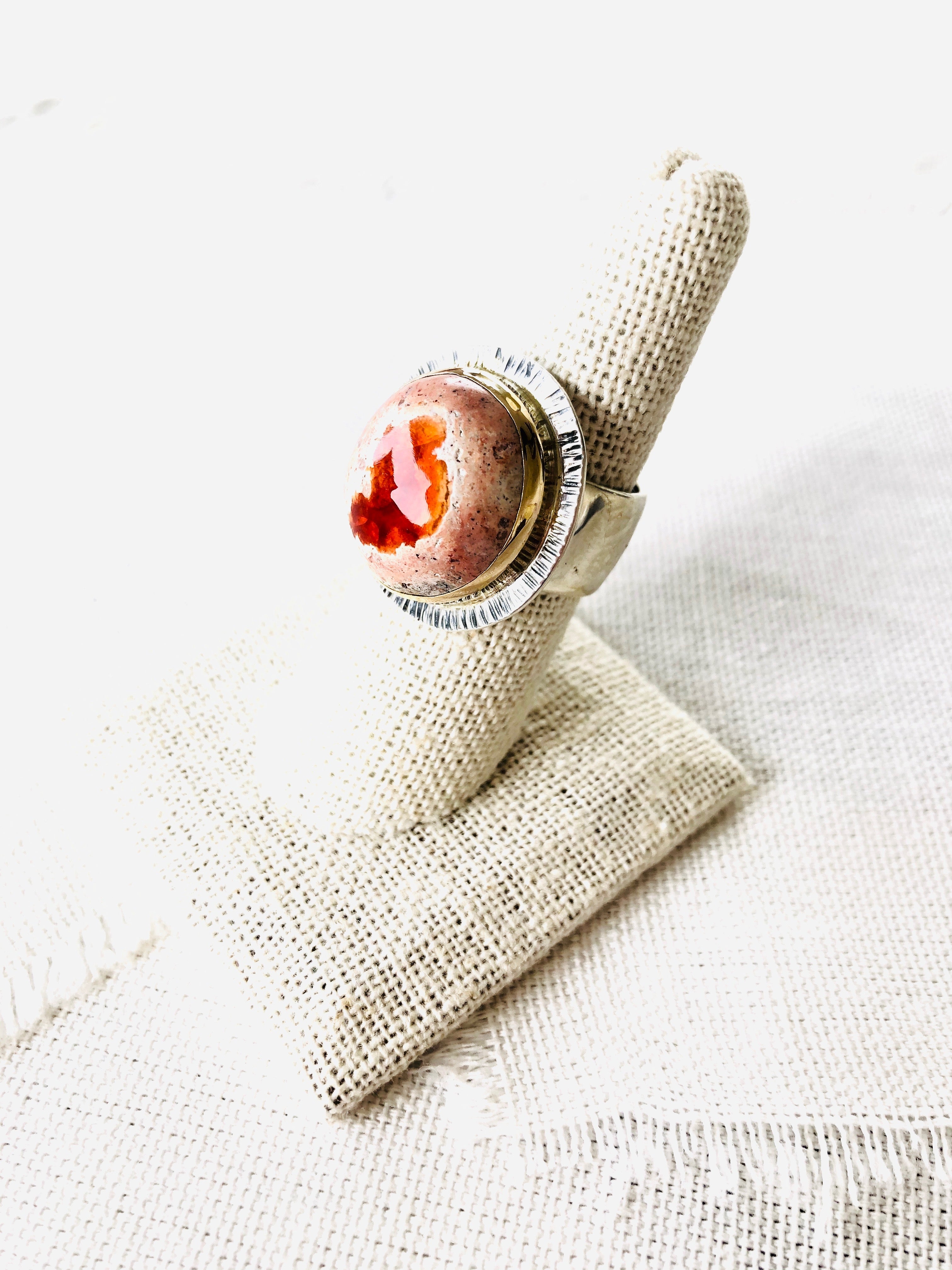Mexican fire opal ring featured in its natural matrix rock.