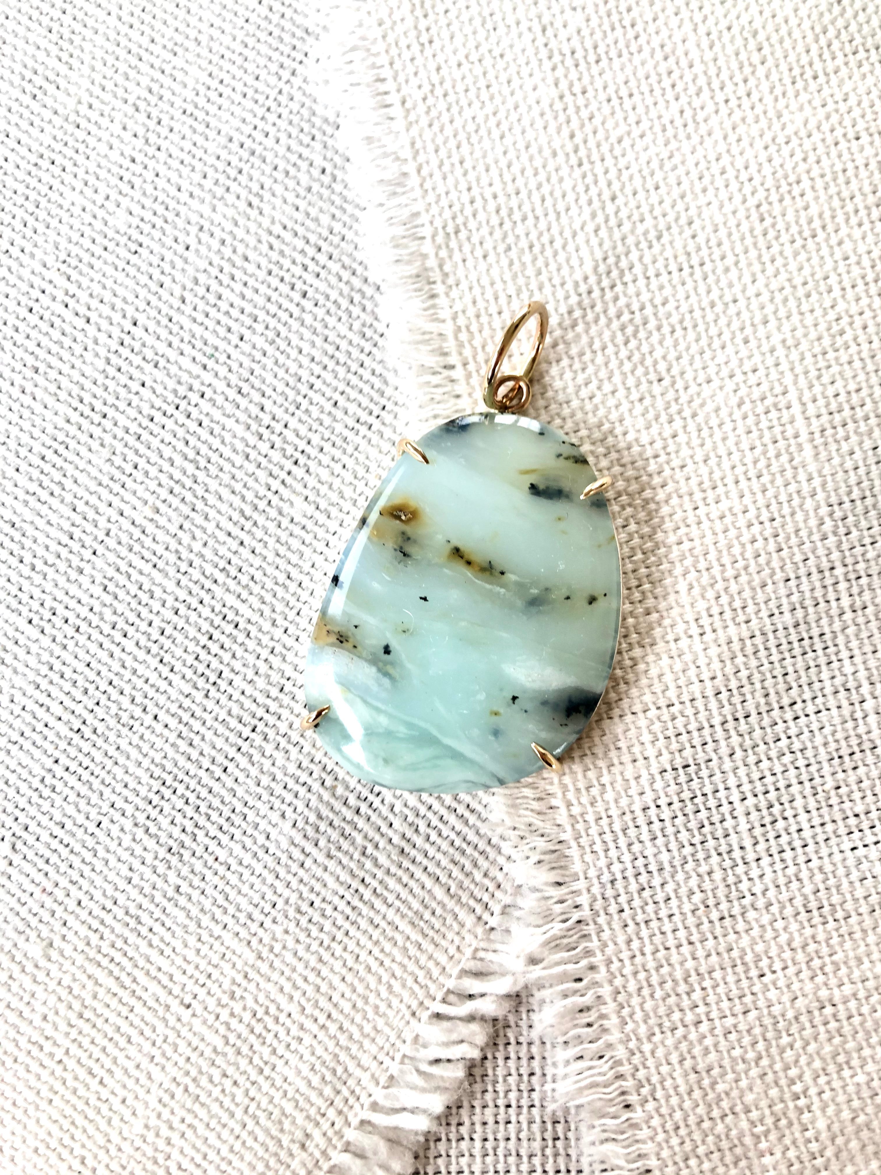 Peruvian blue opal jewelry has such a soft and beautiful blue color.  This beautiful blue opal pendant reminds me of the ocean.